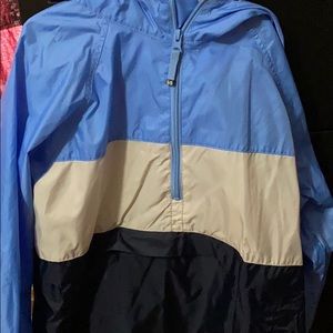 Blue white and black windbreaker